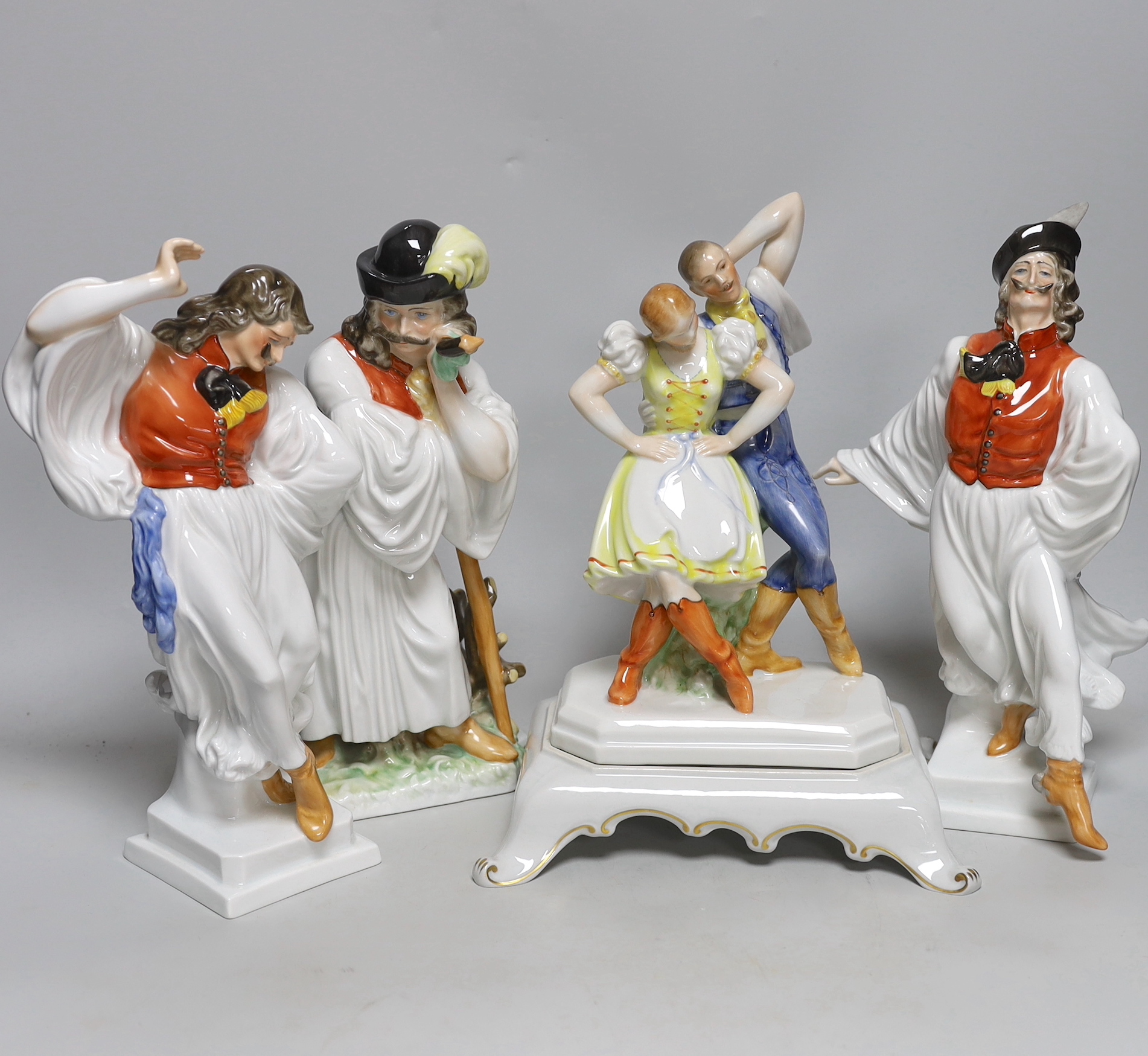 Four vintage Herend figures including pair of dancing figures and a shepherd, each with stamp to the base, the largest 29cm high